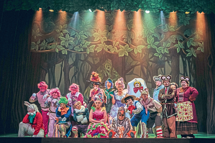 Performers on stage in costume